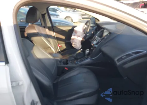 2014 Ford Focus Titanium from USA, damaged, VIN 1FADP3J27EL221699